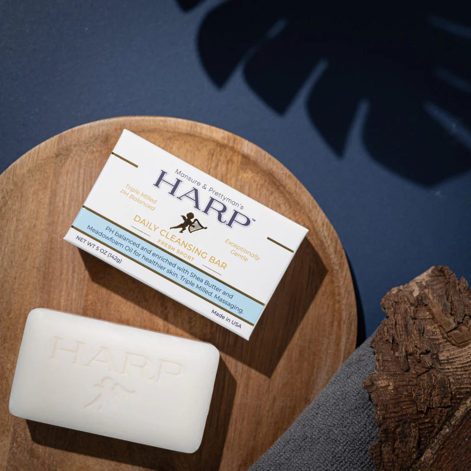 HARP Fresh Sport cleansing bar and carton arranged on a wooden tray